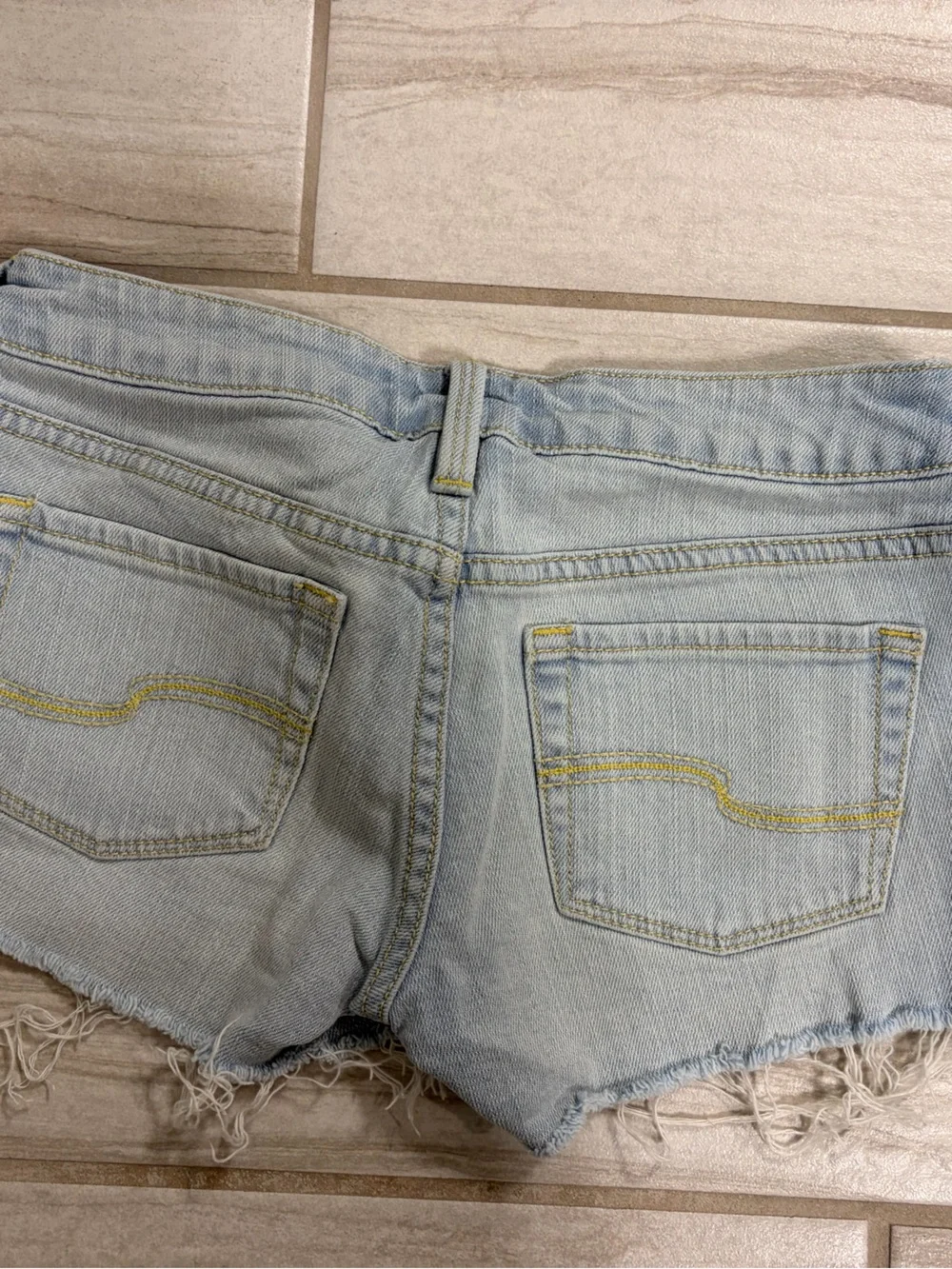 TILT Light Blue Denim Cutoff Shorts